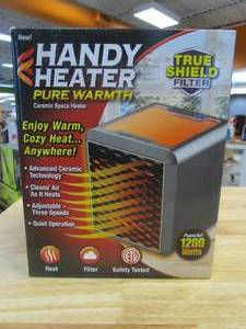 lot 560 image: 800-BTU Fan Heater Electric Personal Space Heater Furnace with UV Light (OPEN BOX)
