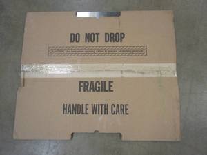 lot 571 image: Broan-NuTone 30 in. x 24 in. Splash Plate for Range Hood in Stainless Steel