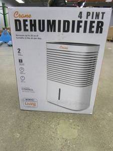 lot 584 image: Crane 4 Pint Compact Dehumidifier with 2 Settings for Small to Medium Rooms up to 300 sq.ft. (OPEN BOX)