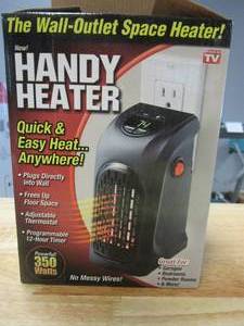 lot 664 image: 350-Watt Wall Outlet Handy Heater (OPEN BOX)