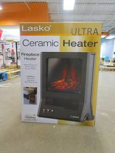 lot 677 image: Lasko Ultra 1500-Watt Electric Ceramic Fireplace Portable Space Heater (OPEN BOX)