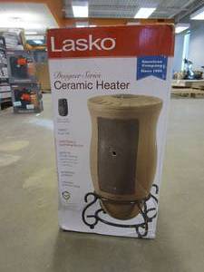 lot 678 image: Lasko Designer Series 1500-Watt Electric Ceramic Oscillating Space Heater with Remote Control (OPEN BOX)