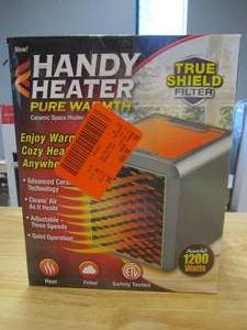 lot 695 image: 800-BTU Fan Heater Electric Personal Space Heater Furnace with UV Light (OPEN BOX)