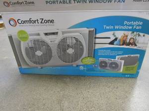lot 761 image: Comfort Zone 9 in. Twin Window Fan with Manually Reversible Airflow Control (OPEN BOX)