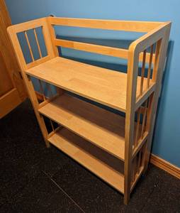 lot 60 image: Folding Blonde Wood Bookshelf