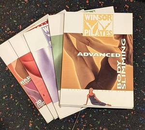 lot 7 image: Pilates DVDs and More
