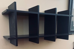 lot 88 image: Unique Black Shelf