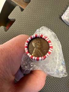lot 17 image: Unsearched Roll of Wheat Pennies