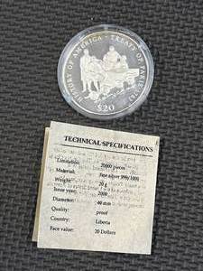 lot 59 image: History of America $20 Silver Coin