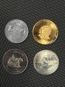 lot 70 image: Lot of 4 Misc. Tokens