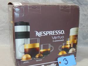 lot 3 image: Nespresso Vertuo Coffee and Espresso Maker by Breville Aeroccino Matte Black
