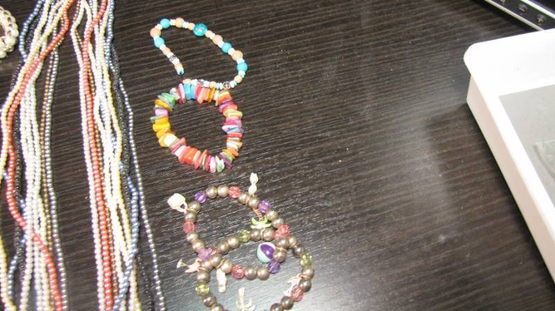 Beaded jewelry collection with wood...