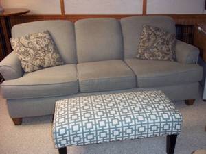 lot 1 image: Nice couch and ottoman, couch is 80...