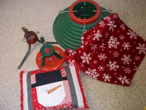 lot 11 image: Christmas tree stands and decor...