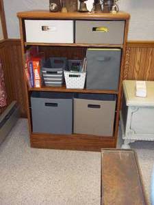 lot 17 image: Solid wood cabinet with DVDs, games...