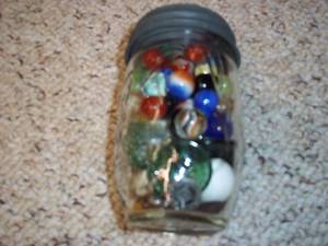 lot 30 image: Jar of marbles...