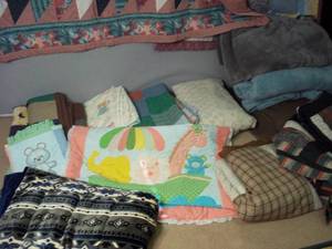 lot 43 image: Handmade quilts, blankets and a Sou...