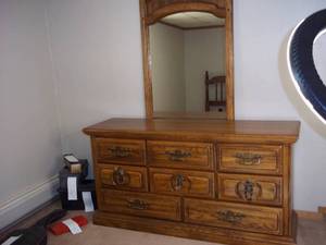 lot 46 image: Dresser with mirror, top is 62x18...