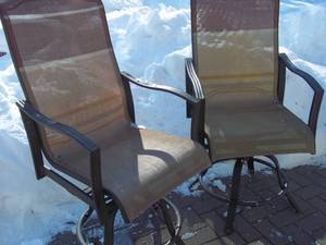 lot 54 image: 2 Swivel patio chairs...