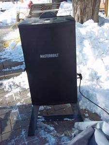 lot 55 image: Masterbuilt electric smoker with co...