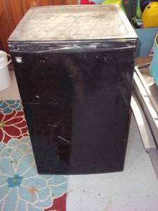 lot 63 image: GE mini fridge...