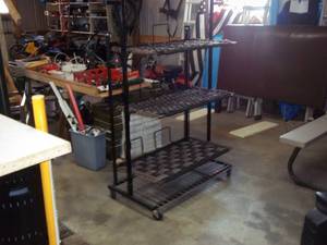 lot 210 image: Metal and rope multi-tier storage shelf or plant stand on wheels