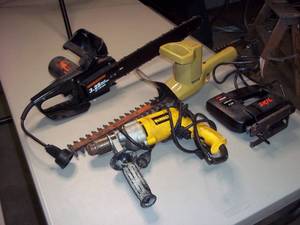 lot 219 image: All Electric powered tools, Remington Chainsaw, Skil Jigsaw,  Dewalt Hammerdrill and Black & Decker Hedge Trimmer
