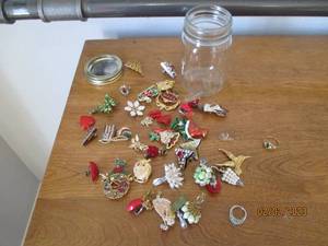 lot 122 image: Smaller lidded Canning style jar fi...
