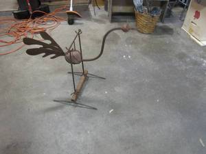 lot 75 image: Bird lawn ornament of rockiron