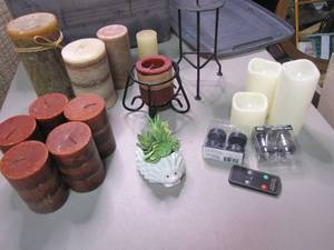 lot 241 image: Lot of assorted Pillar Candles, candle holders, LED flameless candles and more