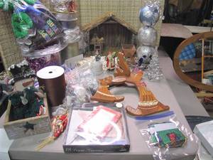 lot 255 image: Assortment of Christmas decor and craft items as well as some party favors.