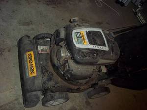 lot 298 image: Yard Man Chipper, Shredder, Vacuum with bag. Parked in fall of 2021, not used over 2022 summer but stored inside.