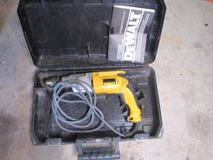 lot 313 image: Dewalt heavy duty dual speed electric hammer drill in hardside case