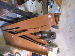 lot 330 image: Metal fold-out bed frame brackets from an Ice Castle Fish House.