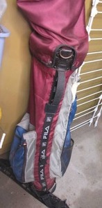 lot 340 image: Fila Golf Bag with assorted golf  clubs and drivers