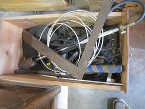 lot 363 image: Wood drawer packed full of garage goodies Brush burning torch, misc hoses, measuring square and more
