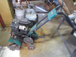 lot 377 image: Weed Eater front tine garden tiller with Briggs and Stratton motor