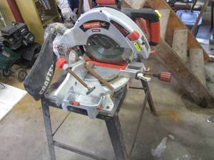 lot 379 image: Craftsman Laser Miter Saw and stand