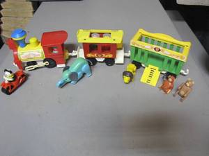 lot 408 image: Vintage Fischer Price Circus Train complete with zoo animals, people and even a motorcycle