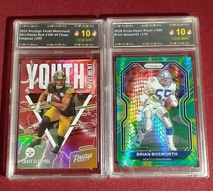 lot 18 image: (2) Slabbed #d Football Cards
