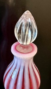 lot 11 image: Vintage Fenton Art Glass Rib Optic Cranberry Opalescent Bottle