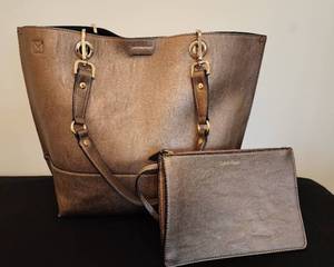 lot 92 image: Classic Bronze Calvin Klein Tote & Make-up BagClutch