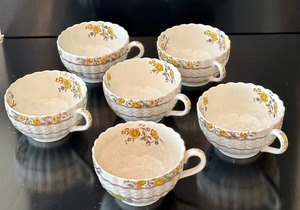 lot 339 image: Six Vintage Copeland Spode Buttercup Pattern Teacups