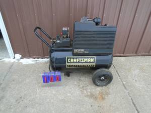 Craftsman professional 5 hp 20 gal quiet series air compressor. Belt driven. Oil filled pump. NOS Sitting in back of warehouse. Tested & Works. As shown. THIS ITEM HAS A RESERVE.