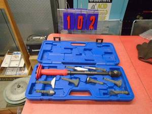 New T & E long reach sheet metal bumping set. As shown.