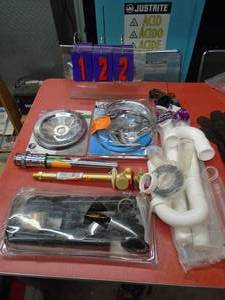 Misc plumbing parts with silcock. As shown.