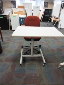 lot 306 image: MAYLINE WORK TABLE WITH HERMAN MILLER CHAIR