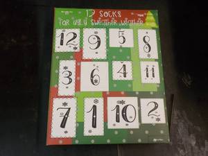 lot 169 image: 12 Socks for Ugly Sweater Weather...
