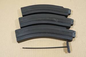 lot 32 image: 3 35 Round Magazines and Loader for S&W AR Format Rifle