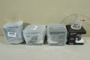 lot 104 image: 4 Lucky Shot Etched Whiskey Glasses with Embedded Bullet